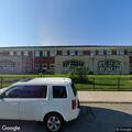 Officer searches for loose brown dog near school