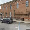 Man jumps from cafe and barks at passerby