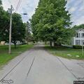 Officers track blue sedan after bank report