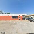 Male with back pain at Colona BG Mini Mart