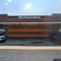 Police check black Kia in restaurant parking lot