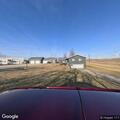 Suspicious car near railroad tracks outside Adair
