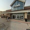 Intoxicated woman wandering parking lot near taxis