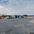 Truck and van in property damage crash at shop