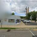 Man hitting woman outside tavern on Mullen Avenue