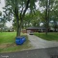 Semi truck damages yard on Park Avenue