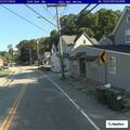 Man throwing garbage cans on Laurel Hill