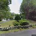 Broken utility pole with wires down on Swantown Road