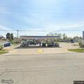 Man asleep in gas station parking lot, not a danger