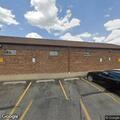 Vehicle hits building at post office on Wolf Road