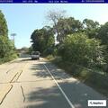Person pulling on door handle at Central Avenue home