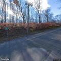 Tree on power lines blocks Kelly Road in Middlebury