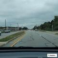 Unoccupied minivan blocking vehicles at store