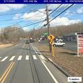 Tree falls on vehicle, blocking lane on Meriden Road