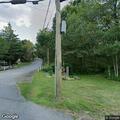Tree on utility wires arcing near trailer home