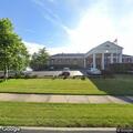 Person unconscious but breathing at Perrysburg care home