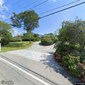 Erratic flatbed truck driving aggressively on roadway