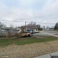 Person trespassing and going through cars at address
