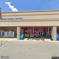 Vehicle impound in front of grocery store