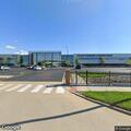 Man losing consciousness but breathing at factory address