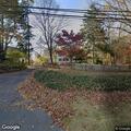 Burning tree branch on utility wires reported