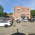 Adult female with stomach issues at Steel Beach Gym