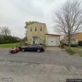 Loose aggressive dog reported on Commerce Street