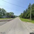 Person running from vehicle on Glenwood Road