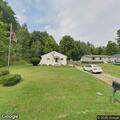 Backyard fire spreading at Andover Township home