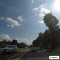Disabled car with flat tire at Route 9W intersection
