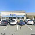 Person experiencing weakness outside store on Charles Street