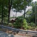 Tree blocking road with wires in Damascus Township