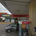 Semi with leaking wheel hubs at truck stop