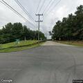 Person experiencing syncope at road intersection in Lisbon