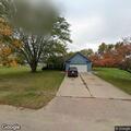 Caller reports unknown person in her basement