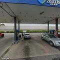 Person ill at gas station on East Mall Drive