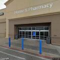 Distressed woman crying and kicking near SUV at Walmart
