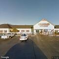 Person experiencing chest pain at local restaurant