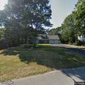 Person experiencing hip pain at residence