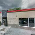 Delivery truck hits drive-through overhang