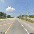 Jet ski on fire in roadway on Arbor Cove Drive
