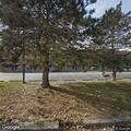 Person possibly unconscious in car at hotel parking lot