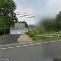 Person with shoulder and back pain after fall in pasture