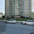 Police assist woman retrieving items from apartment