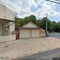 Tree on wires smoking near Anderman Oil in Mountaindale