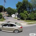 Car and bicycle crash on North Grand Avenue