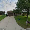 Suspicious person reported creeping through yards