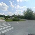 Suspicious person standing near intersection