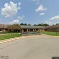 Female patient lift assist at care center near Green Hall