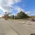 Person unconscious in running vehicle at intersection
